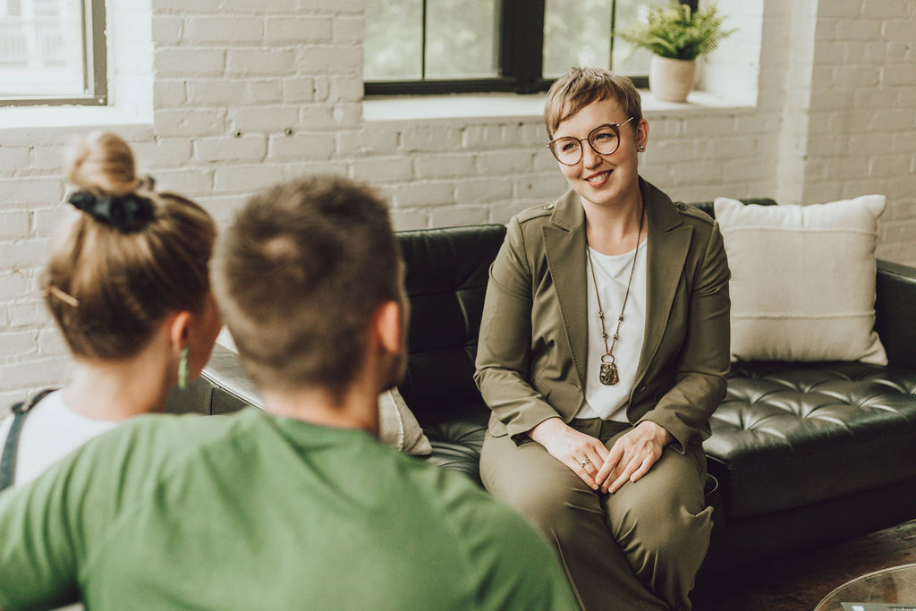 Whitney Emanuel meeting with clients
